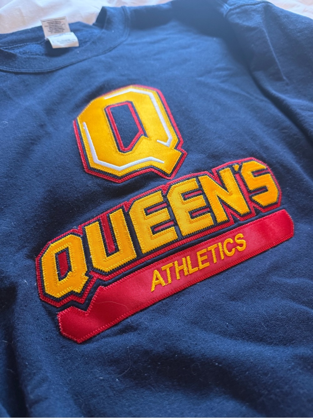 Queen’s Athletics University Navy Crewneck with Yellow and Red Embroidery